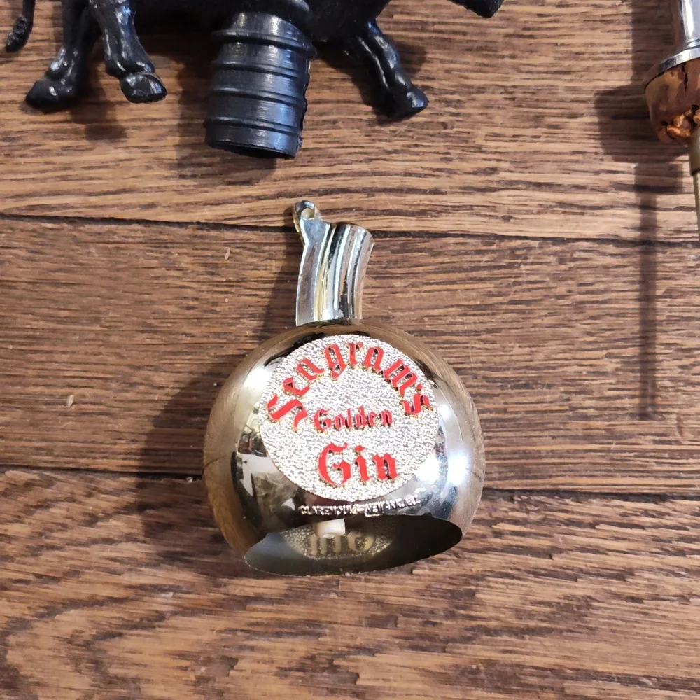 Lot Of vintage plastic bull head bottle pourer and stopper
